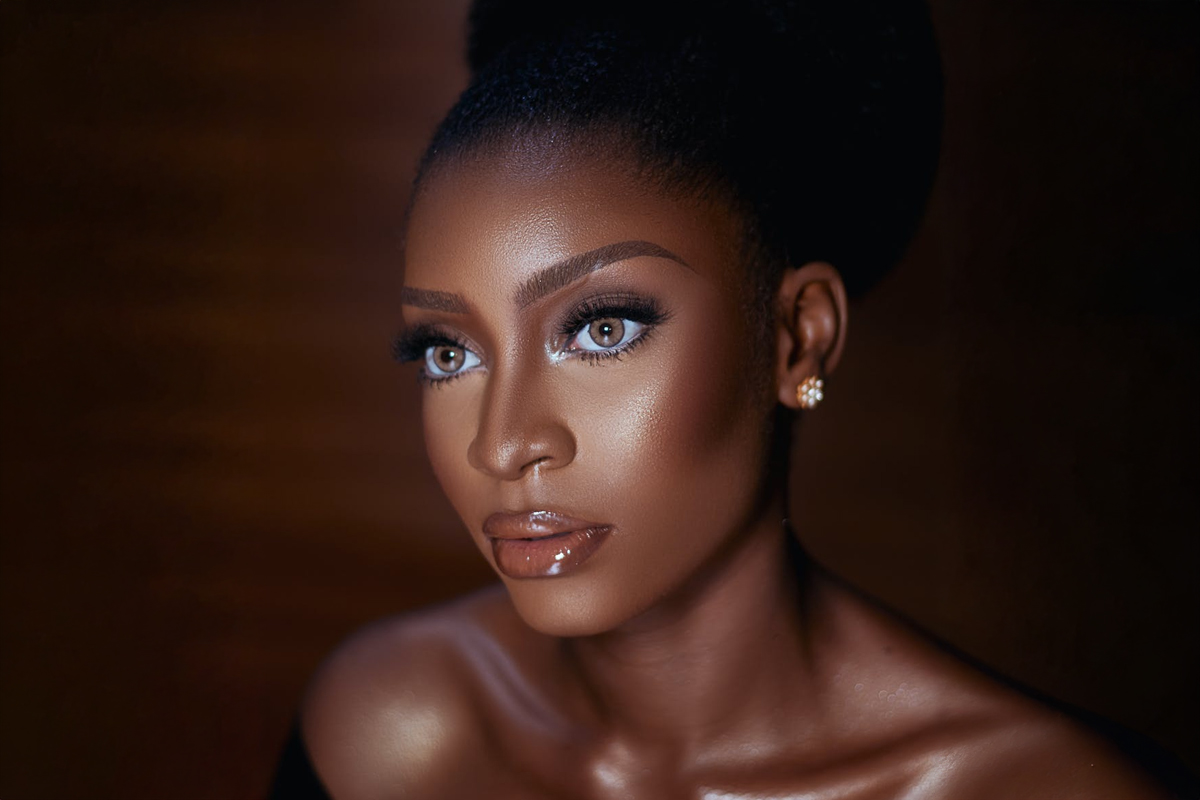 Close-up of a woman with smooth, youthful skin, illustrating potential areas for cosmetic Botox injection such as forehead, eyes, and lips